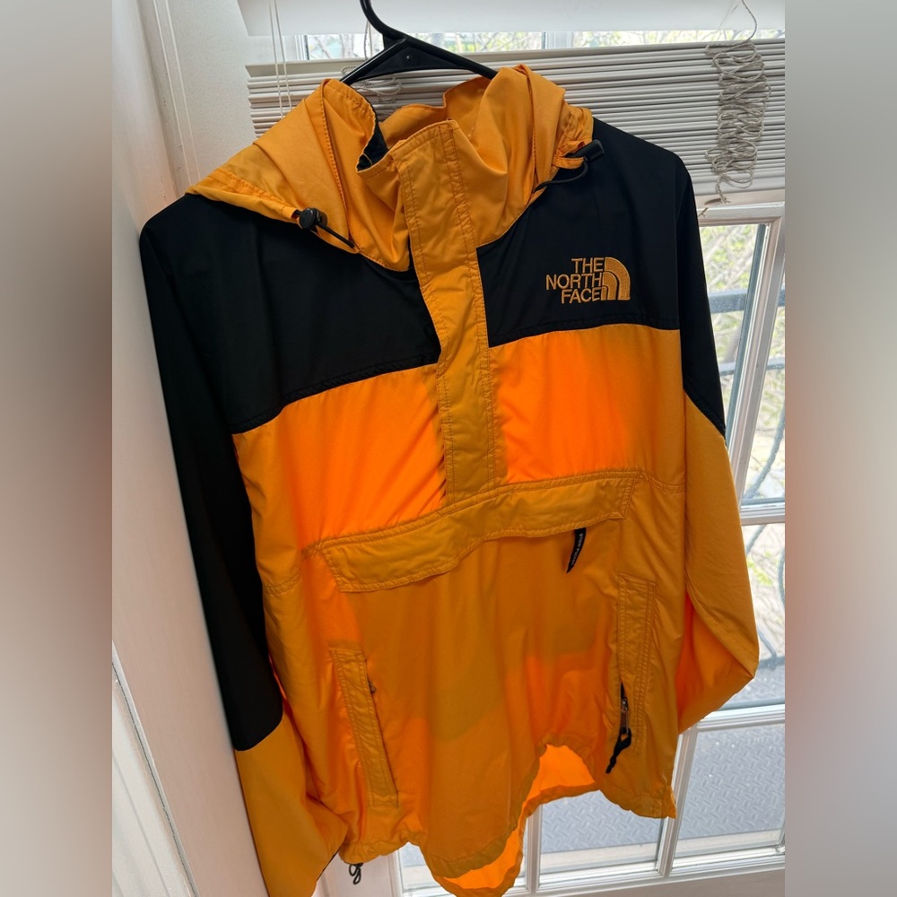 The North Face Yellow and Black Jacket
